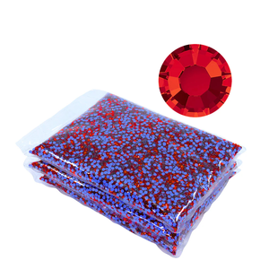 Wholesale packaged lt siam hinestones with a close-up of a red rhinestone on a white background